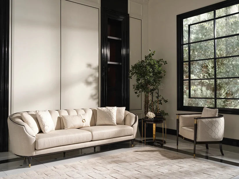 Modern luxury armchair paired with nested wood-top gold side tables