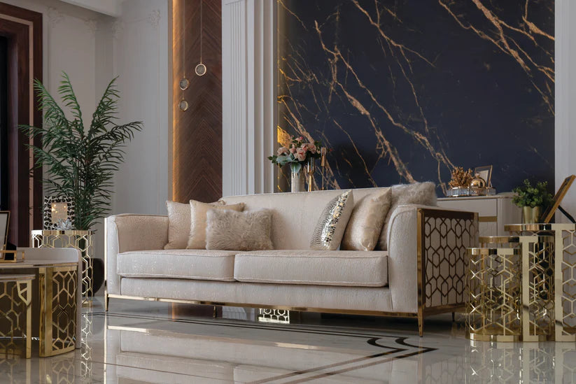 Elegant cream sofa with golden accents in modern interior