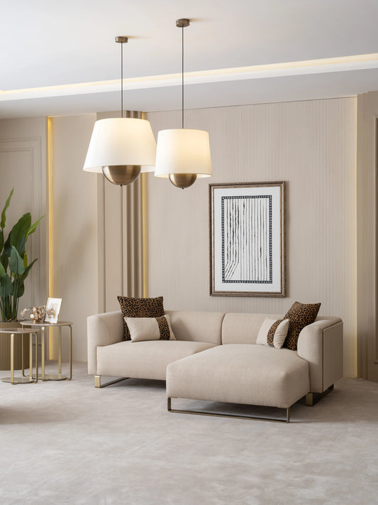 Massimo L Shaped Couch, armchair, and nesting table, part of the Massimo Corner Sofa collection, arranged in a modern living room. Luxe Life Furniture. Massimo L Shaped Couch, armchair, and nesting table, part of the Massimo Corner Sofa collection, arranged in a modern living room. Luxe Life Furniture.