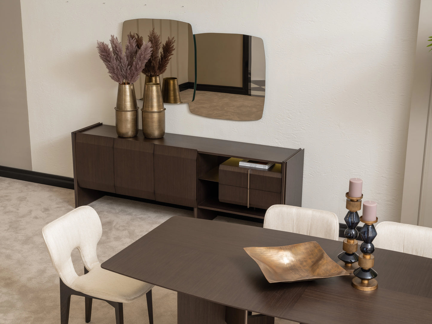 Modern dining room with Moka sideboard, abstract mirror, and cream dining chairs