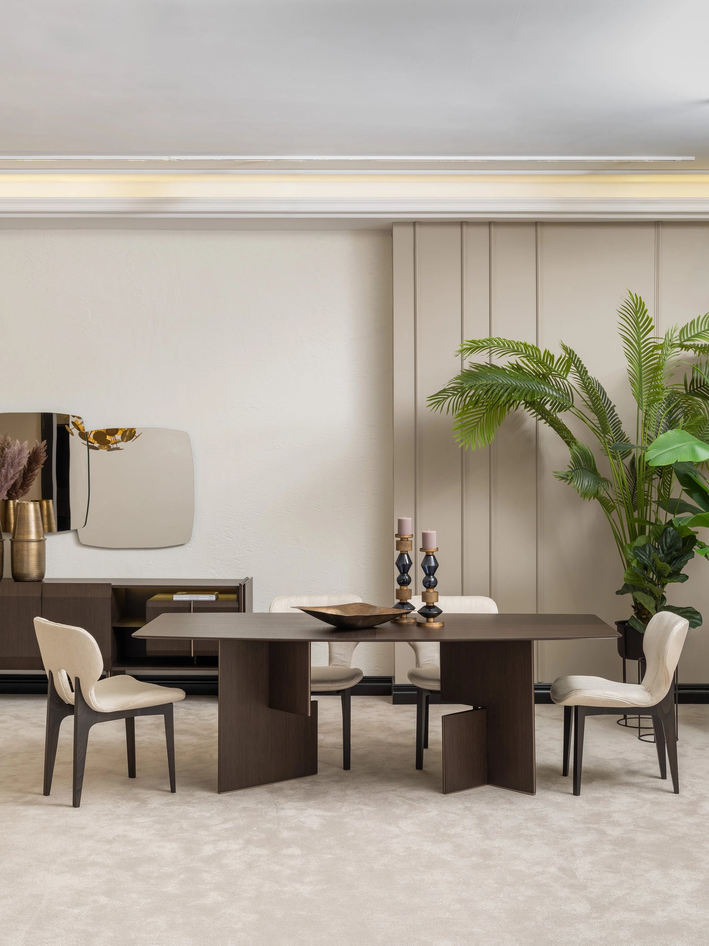 Moka dining table and four upholstered chairs with contemporary sideboard and mirror