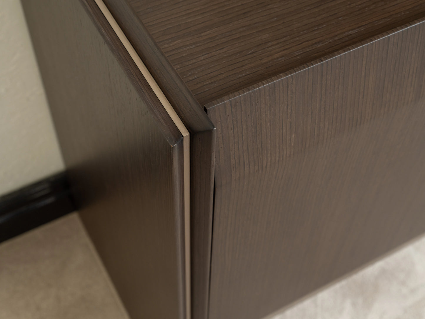 Close-up of Moka sideboard corner showing premium dark wood grain detail