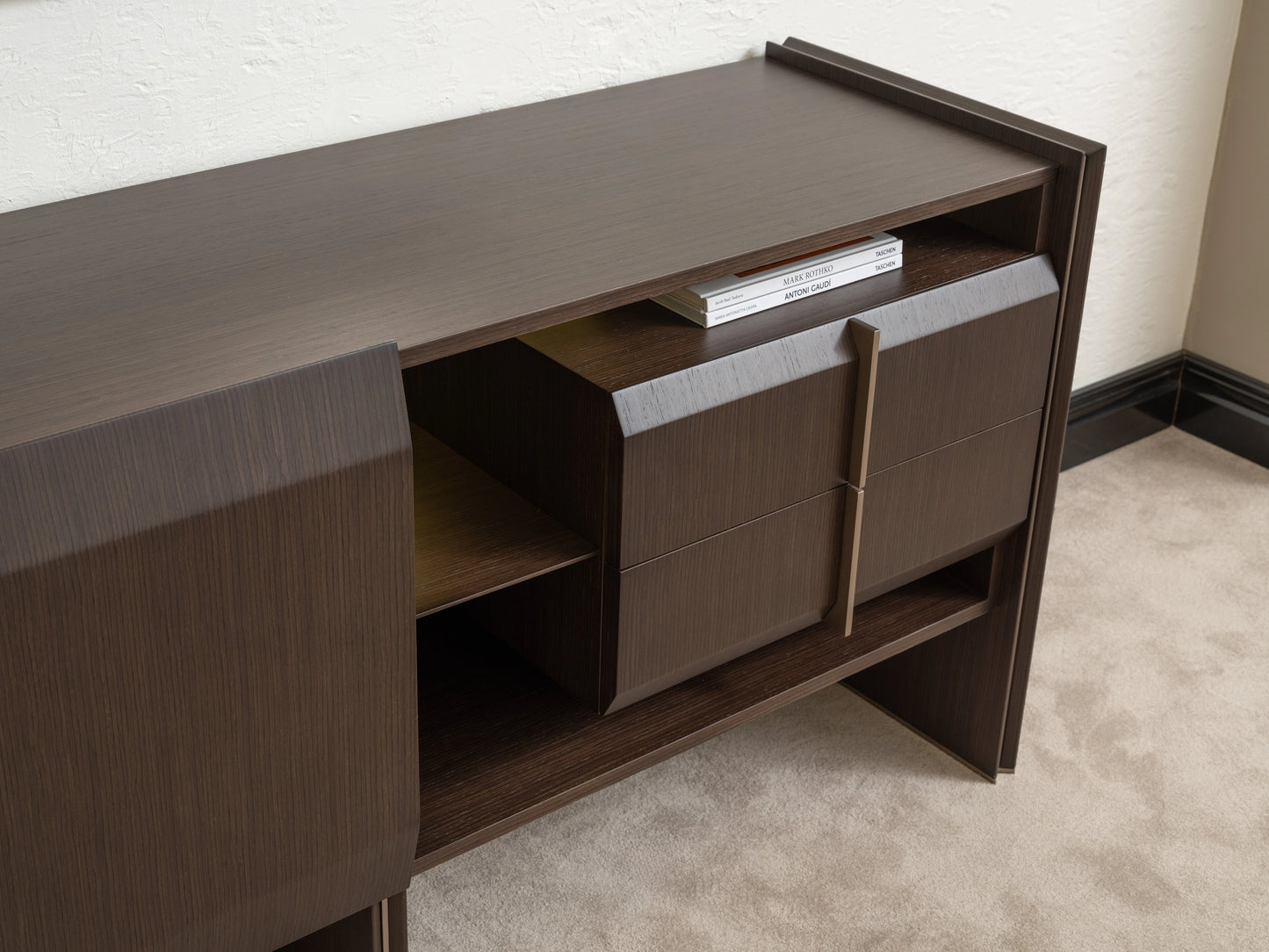 Modern Moka sideboard with open shelving and storage drawers, styled with books