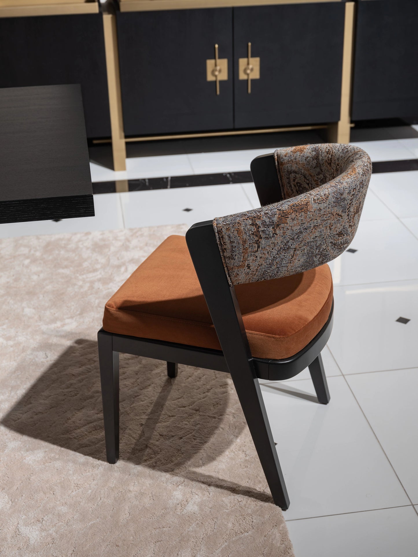 Stylish dining chairs paired with Pietra table