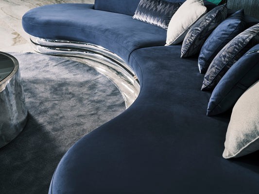 Ferre curved 5 seater sofa in a modern living room Ferre curved 5 seater sofa in a modern living room