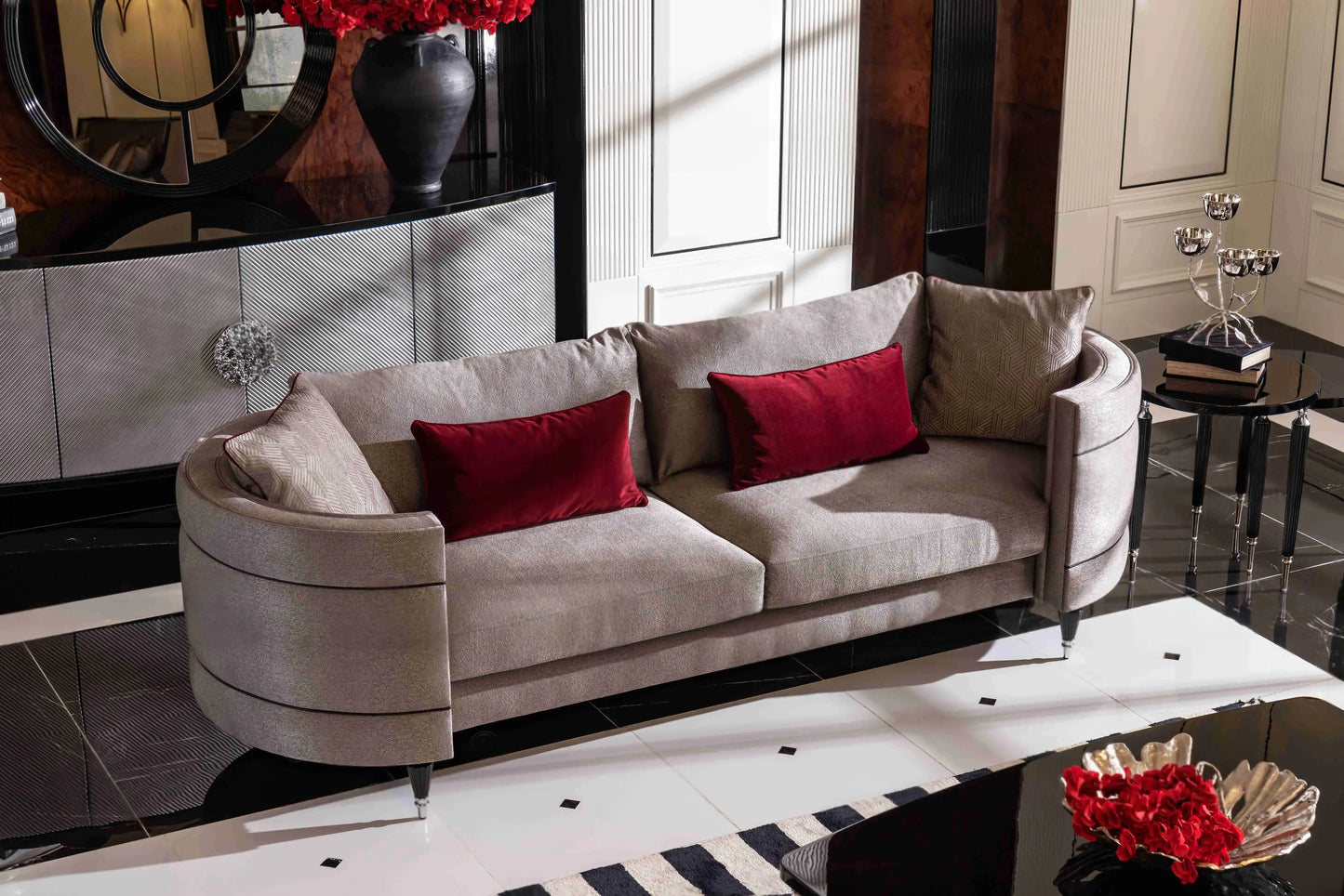 Close view of the four-seater oval sofa, part of the Venedik Sofa Set, with a nesting table. Luxe Life Furniture.