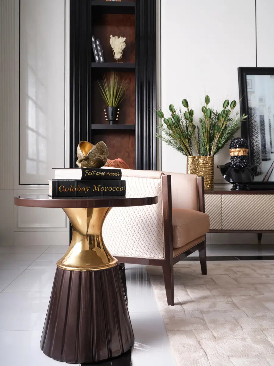 Side close-up of the Venedik Dining Set side table with the armchair behind. Luxe Life Furniture.