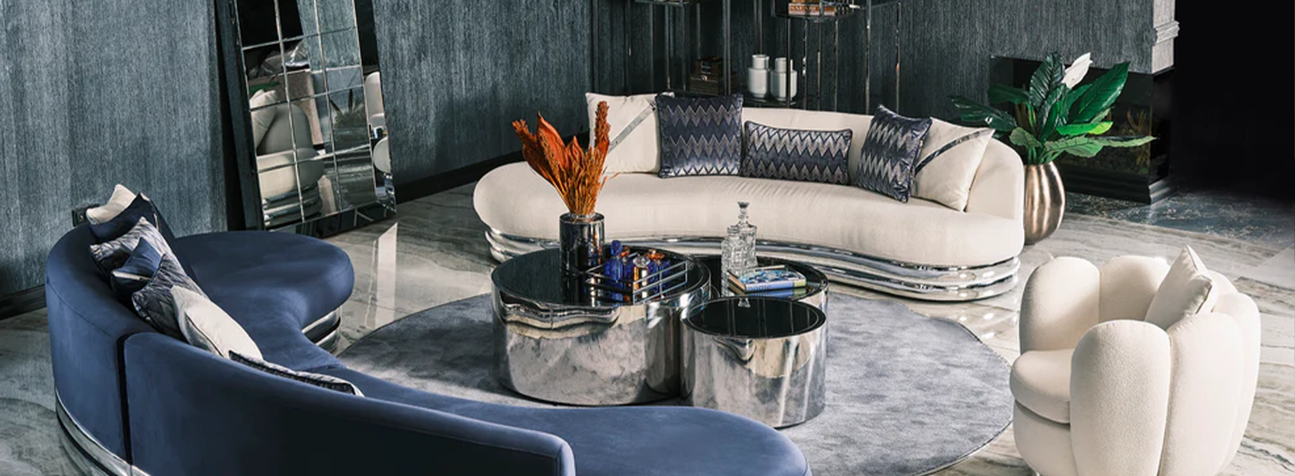 Curved settee in cream and blue  velvet with silver legs