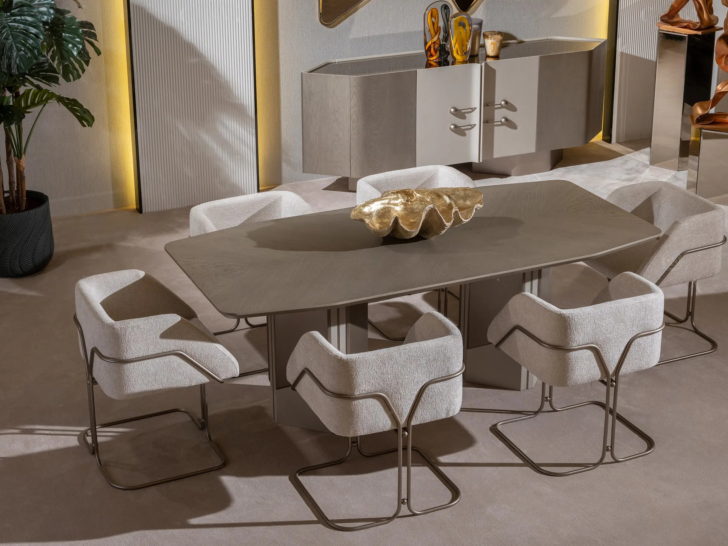 Modern beige dining table with plush chairs