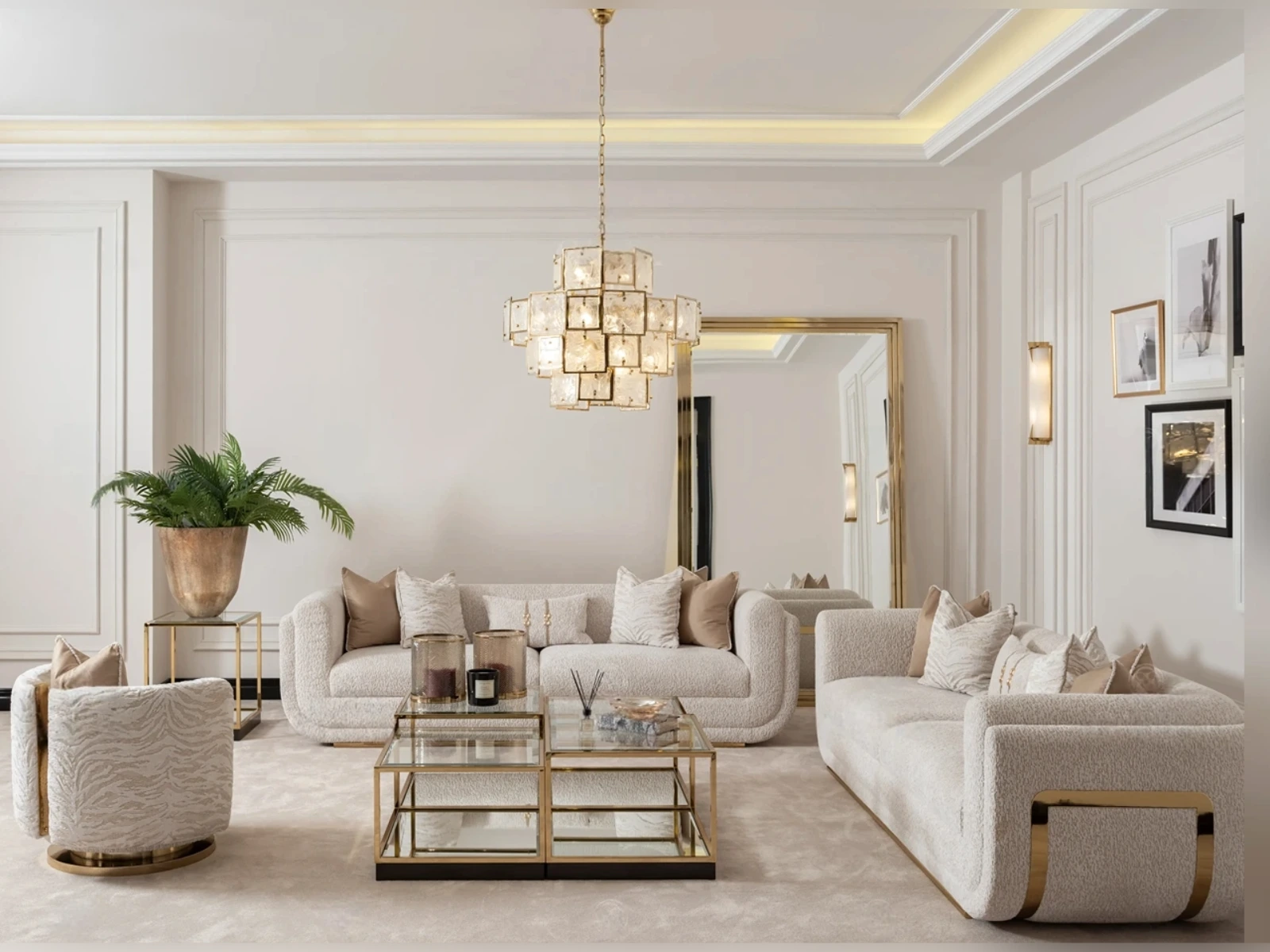 Modern living room with beige sofas, a glass coffee table, and decorative elements.