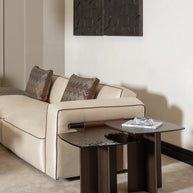 Side view of the sofa showing the side table beside it 