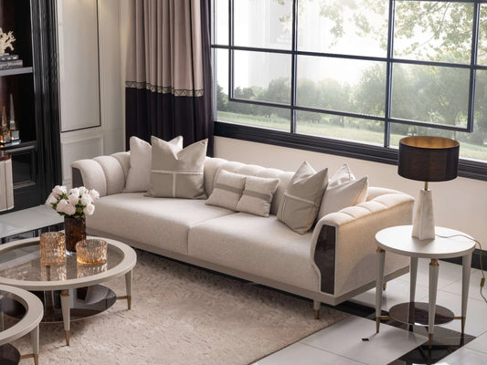 Ecrue Sofa Set featuring a 4 Seater Luxe Sofa, 4 Seater with Leather Upholstery, Elegant Armchair, Coffee Table, and Side Table in a modern living room setting. Luxe Life Furniture.