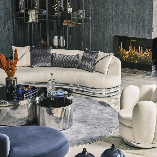 Elegant Ferre curved settee sofa showcasing its unique silhouette - Luxe Life Furniture.