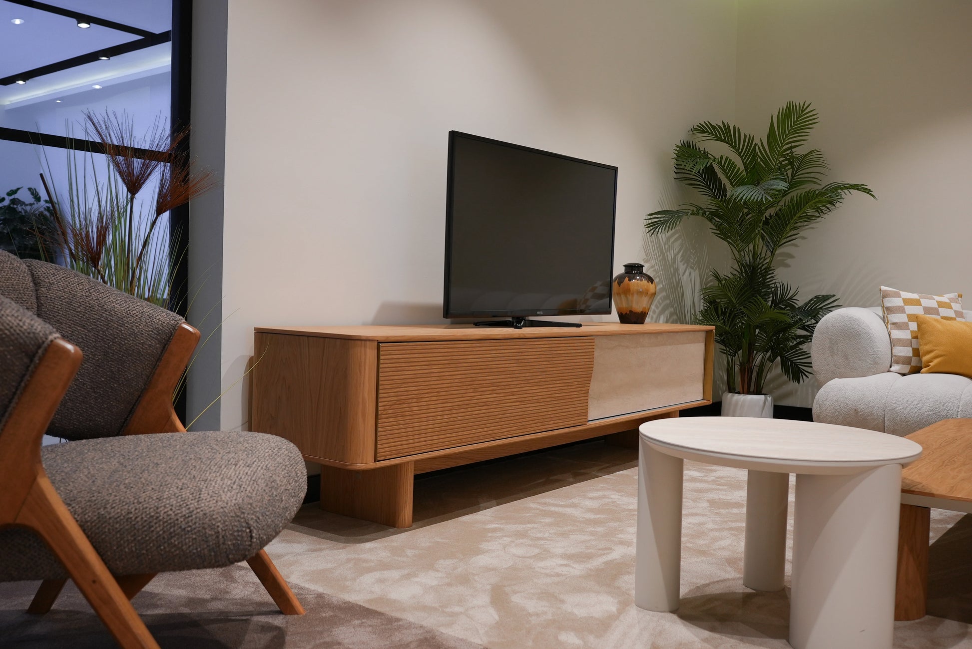 Side profile of Lia Armchair  UK with elegant proportions
