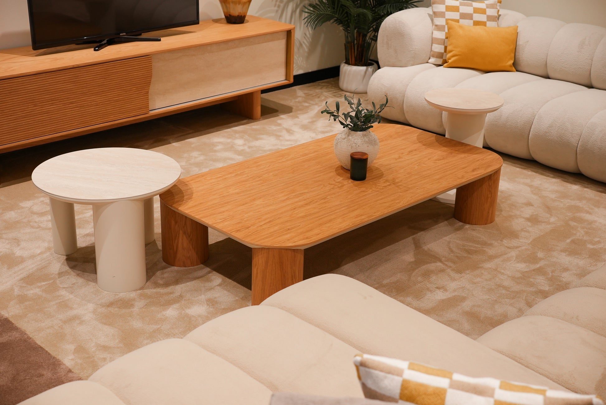 Partial angled view of Lia Sofa Set highlighting the armrest