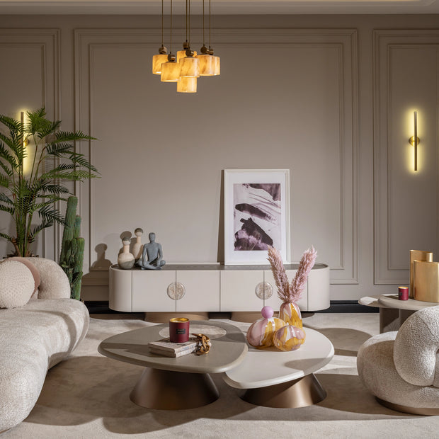 Oval white coffee table in a modern living room setting