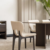Contemporary Moka dining chair with cream fabric upholstery and dark wood legs