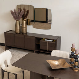 Modern dining room with Moka sideboard, abstract mirror, and cream dining chairs