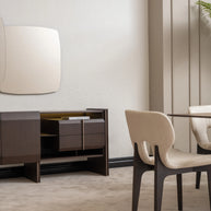 Modern dining room scene with Moka sideboard, mirror and dining chair in focus