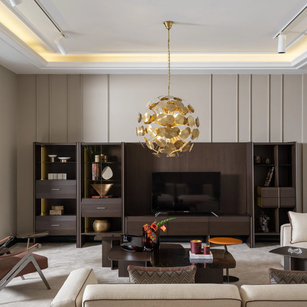 Modern living room with Moka TV unit, gold pendant light, accent chairs, and coordinated shelving