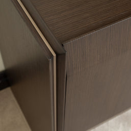 Close-up of Moka sideboard corner showing premium dark wood grain detail