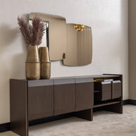 Contemporary Moka sideboard with gold vases and statement mirror on neutral wall