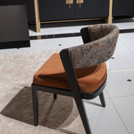 Stylish dining chairs paired with Pietra table
