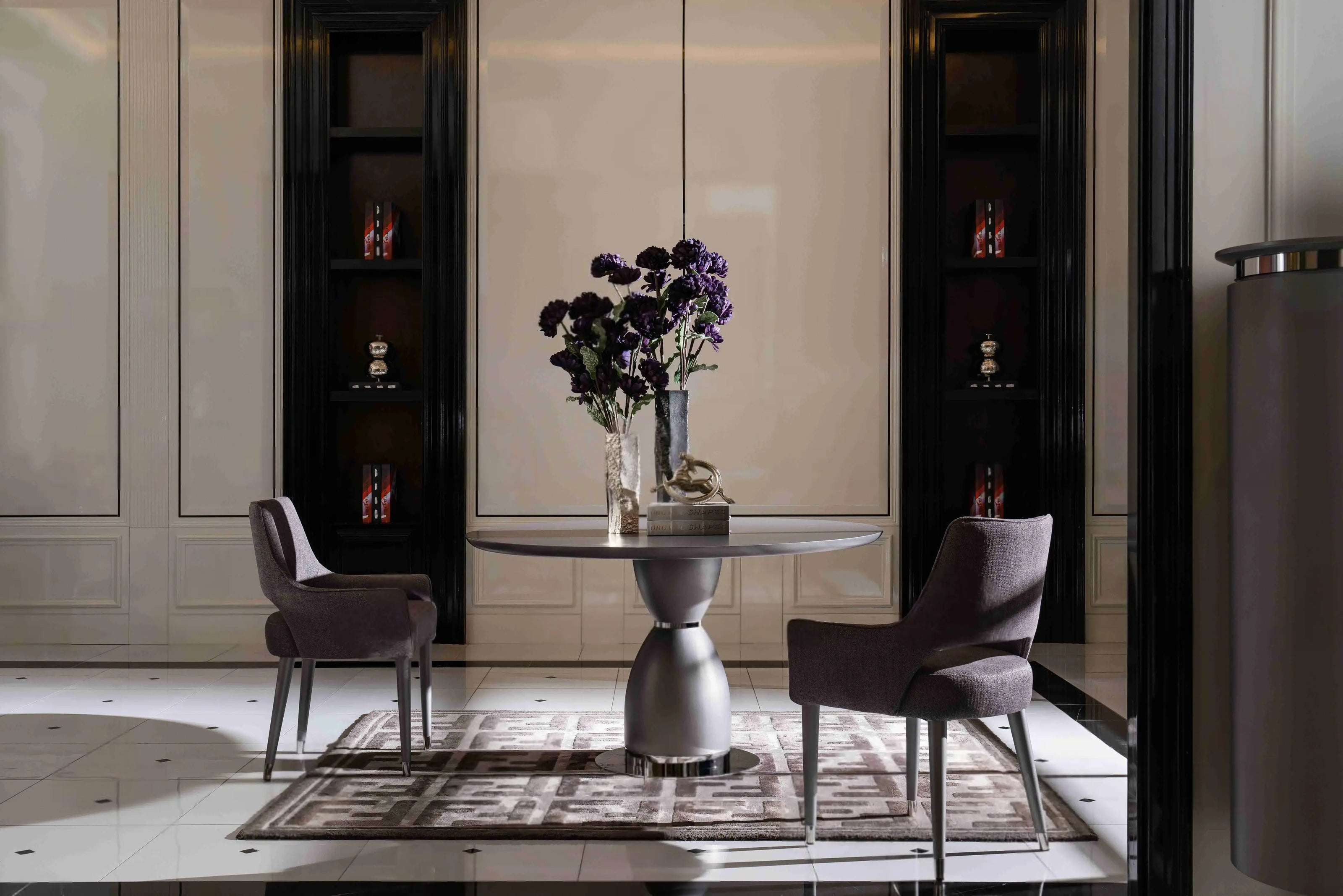 Side view, Porto round table, 2 armchairs, showing table design. Part of the Porto Dining Set. Luxe Life Furniture.