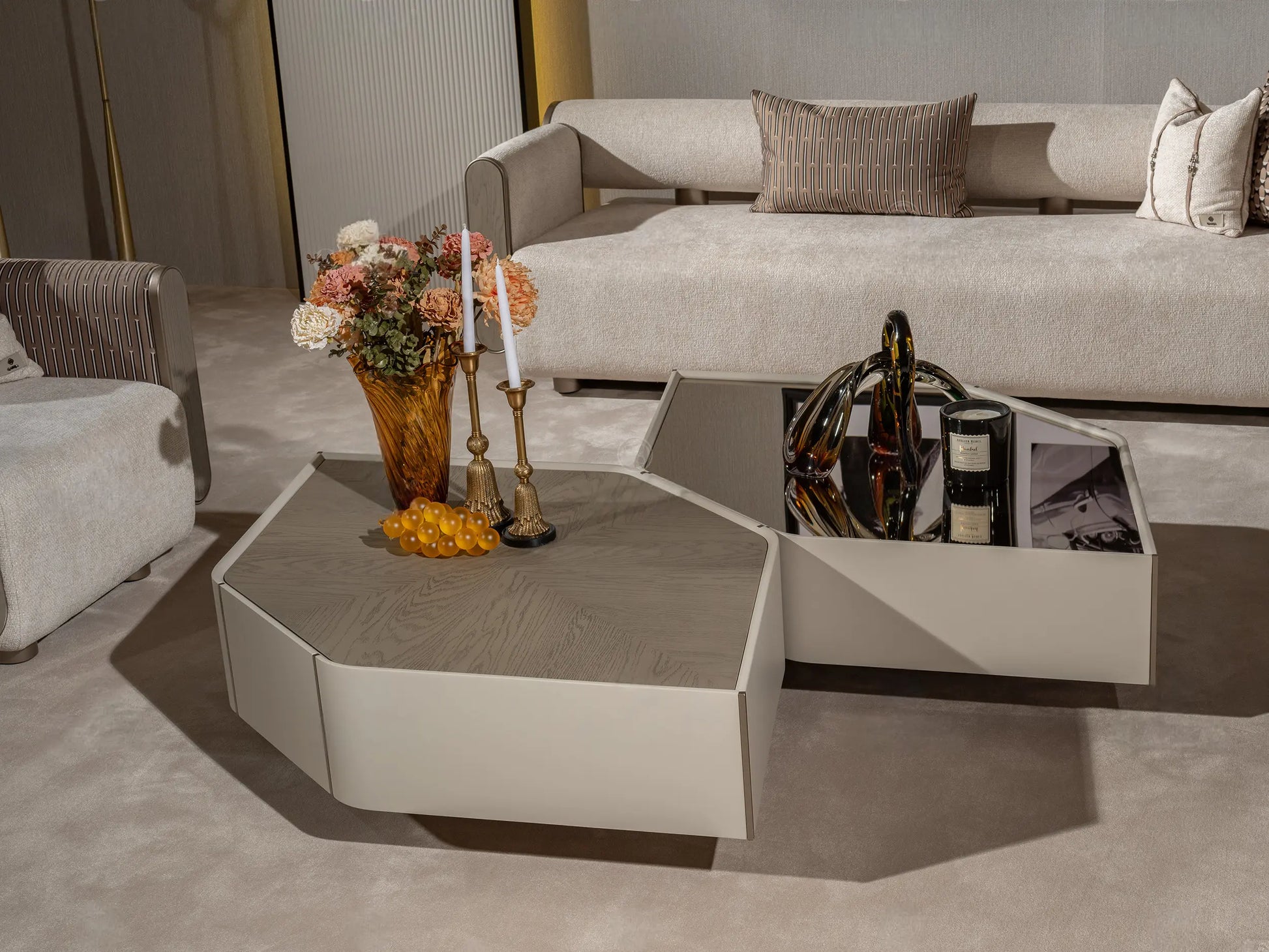 Neutral-themed room with wooden and mirrored top Ricamo table
