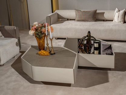 Neutral-themed room with wooden and mirrored top Ricamo table