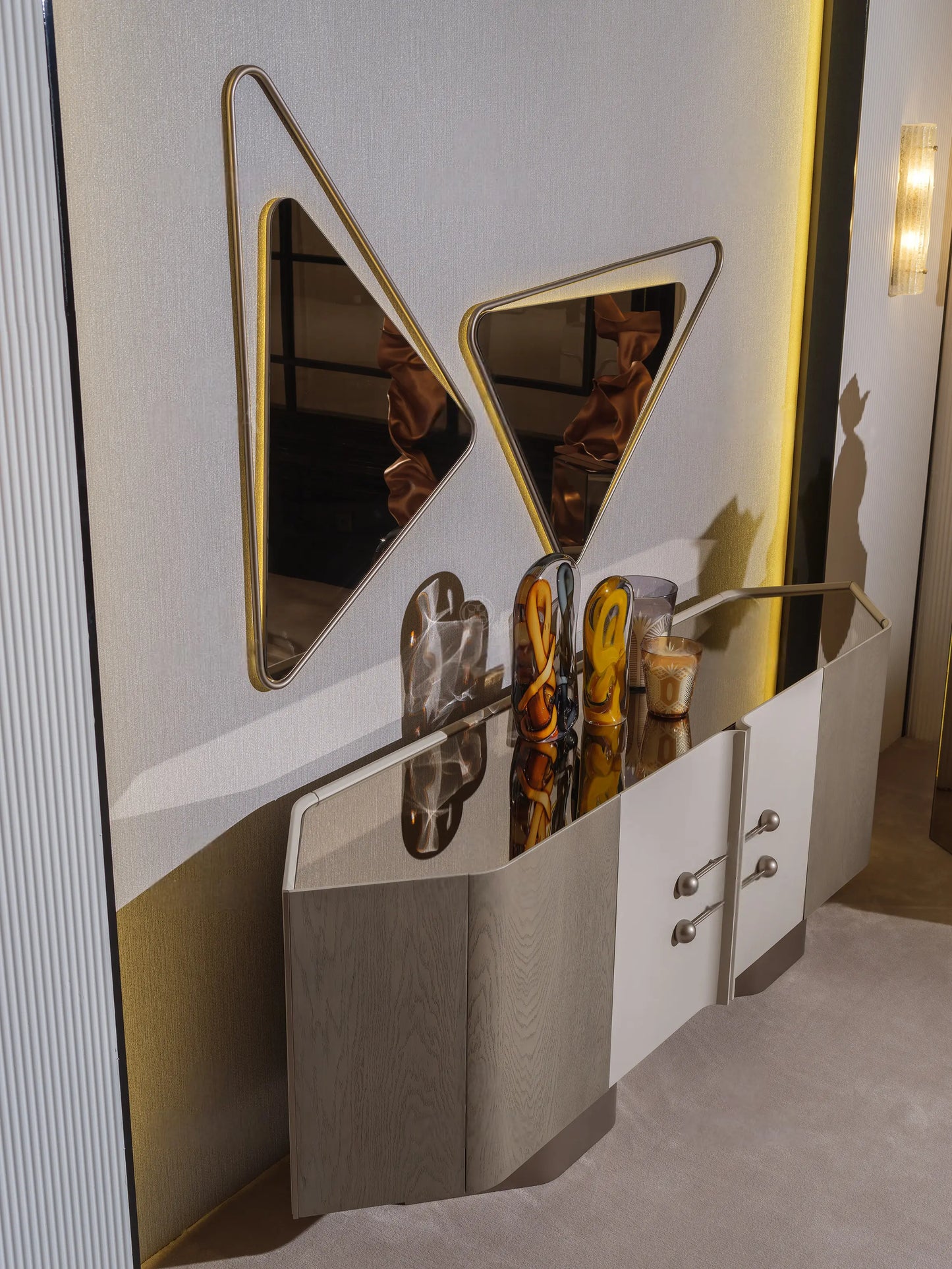 Modern beige sideboard under wall mirror