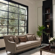 Side view of Varna 4 seater sofa with partial coffee table.